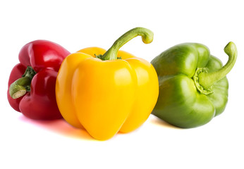 Three large peppers of different colors