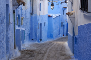 Streets of the Chefchaouen town with a blue houses in old Medina in Morocco.