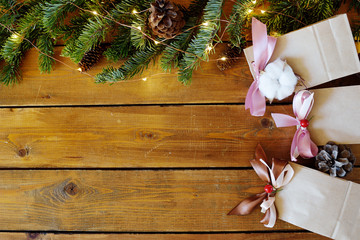 Christmas fir tree with decoration on dark wooden board