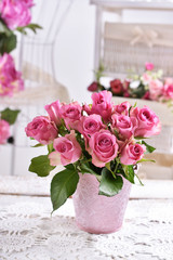 beautiful bunch of pink roses on the table