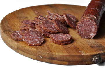 Sausage on a wooden board isolated on a white background.Food