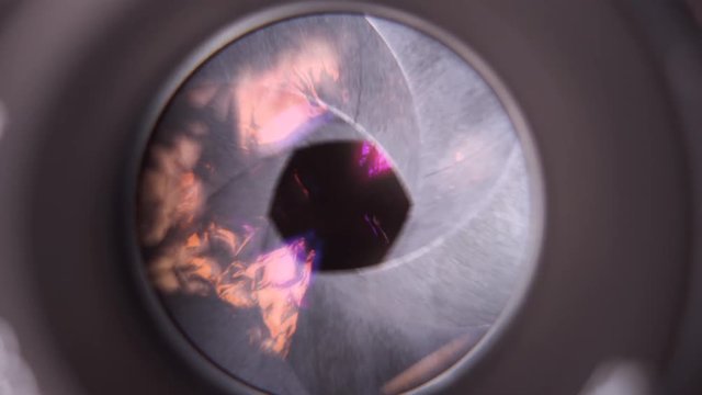 Close up macro shot of aperture of lens with metal curtain aperture nice footage.