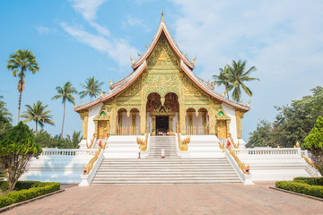 Fototapeta premium An iconic Buddhist temple in the royal palace of Luang Prabang, the UNESCO world heritage site in north central of Laos.