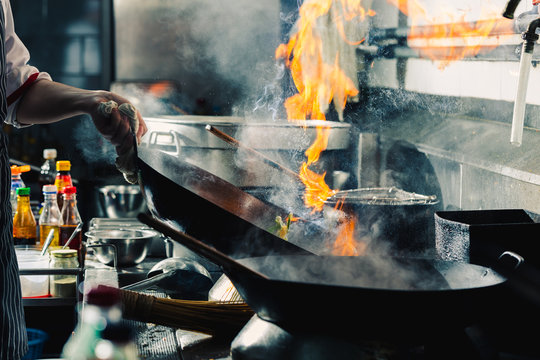 Chef Stir Fry In Wok