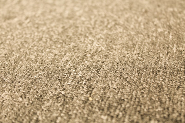 Fototapeta na wymiar Beige fabric texture abstract background. Textured backdrop as copy space for text. Carpet detailed close up.