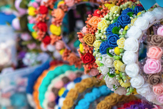 Many multi-colored handmade polymer beads. Bright cheap decorations, focus with a shallow depth of field.