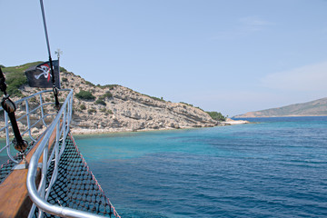 Ship is traveling with pirate flag 