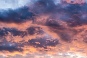 Beautiful sky with multicolored clouds at sunset.