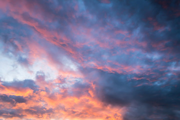 Beautiful sky with multicolored clouds at sunset.