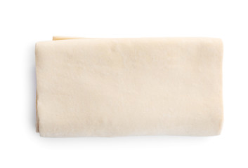 Fresh dough on white background, top view. Puff pastry