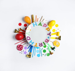 Composition with birthday party items on white background, top view. Space for text