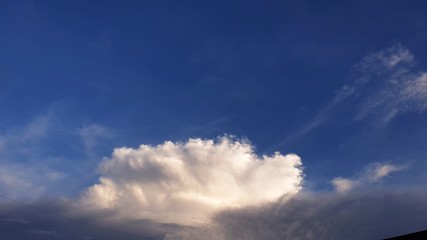 Fototapeta na wymiar Sky Clouds ,sea wave shape sky clouds, sign of happiness and nature power 