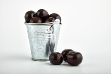 Fresh cherry on plate on wooden blue background. fresh ripe cherries. sweet cherries.