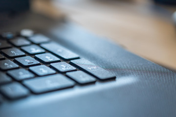 A laptop on a dirty work surface in the industry