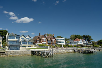 Sandbanks houses known as Millionaires Row on Poole harbour on the Dorset coast