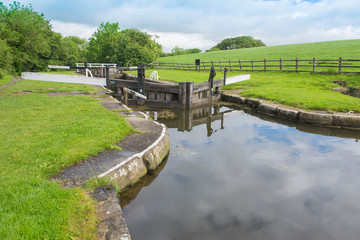 Fototapeta premium View of a British canal lock in rural setting