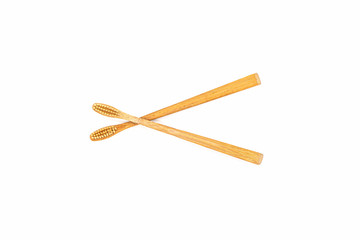 Bamboo toothbrush on white background.