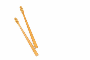 Bamboo toothbrush on white background.