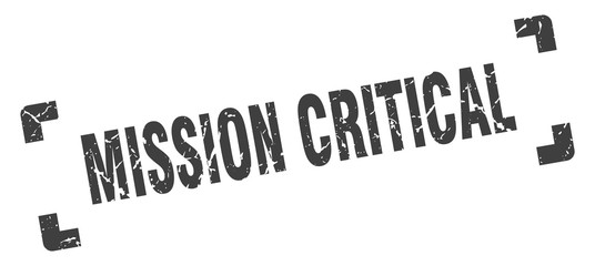 mission critical stamp. mission critical square grunge sign. mission critical