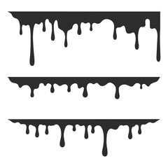 drips of black paint on white background
