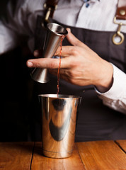 Bartender making a cocktail. close up shot