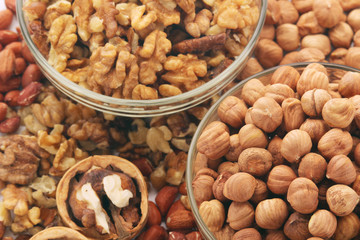 Different nuts in glass cups	