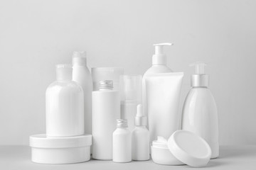 Set of cosmetic products on light background