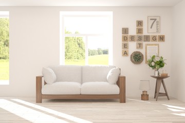 Stylish room in white color with sofa and summer landscape in window. Scandinavian interior design. 3D illustration