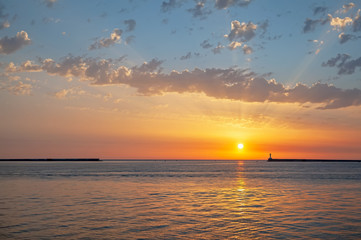 Magnificent sunset over the sea with clouds.