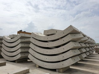 Precast concrete plant with blue sky in the construction site, in storage yard area at Thailand, Space for text in template, Concrete Tunnel Segments