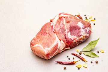 Raw fresh pork shoulder with spices