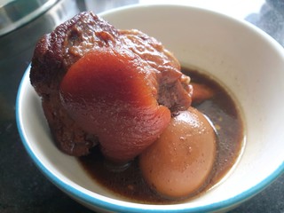 Thai food style, Selective focus of stewed pork leg and boiled egg in white bowl, This food is most popular Thai food, Ka moo is Thai traditional, ready to eat
