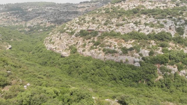 The ruins of the late Hellenic Jewish settlement Hurvat Sumak on Mount Carmel, Israel. View from the drone.