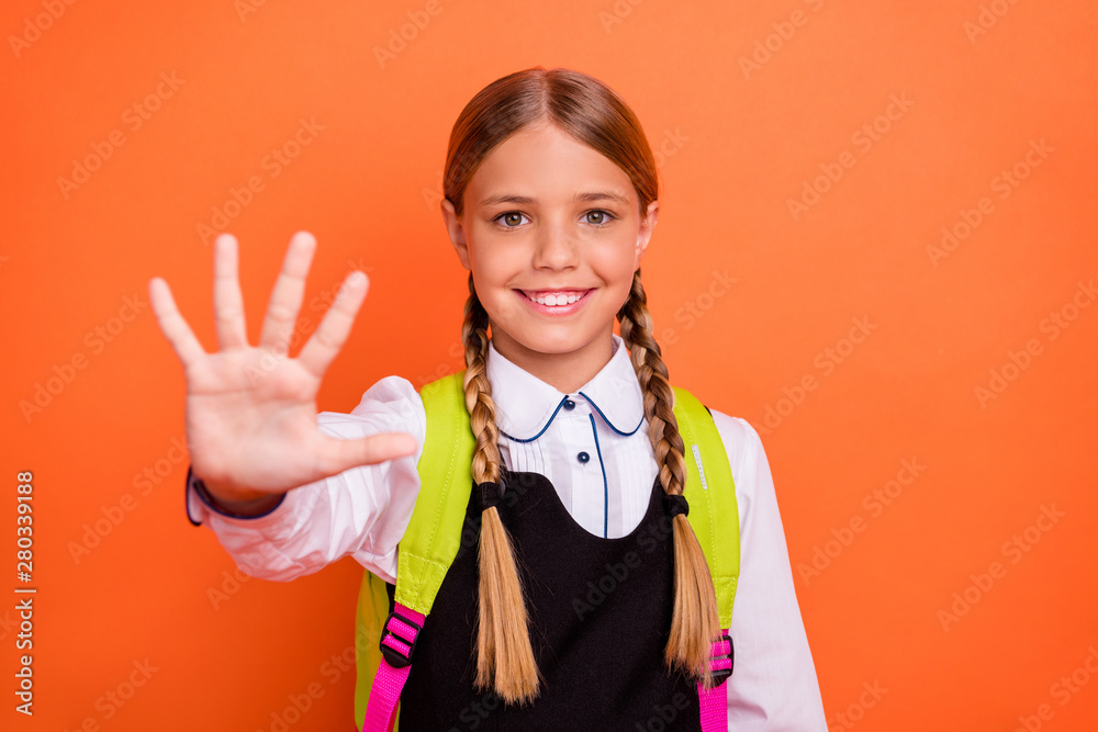 Sticker Close-up portrait of her she nice attractive cheerful cheery confident content diligent pre-teen girl showing five 5 good mark score grade isolated on bright vivid shine orange background