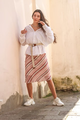 Young beautiful lady wearing a stylish white shirt.Portrait shooting of a stylish girl.Trends summer 2019.