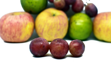 orange, grapes and apple group isolated on white background. Horizontal composition for package design