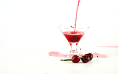 elegant cocktail fresh red cherry white background
