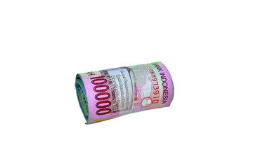 rolls of Indonesian money rupiah. Isolated on white background