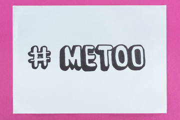 top view of paper with hashtag me too with meaning against violence on pink background