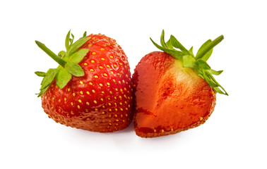 Half of strawberry. Isolated on white background. Juicy fresh red berry cut in half. Chilled fruit from the fridge.