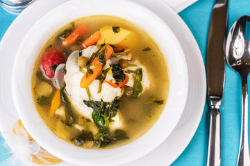 Mediterranean squid, chicken, crab meat and vegetable soup