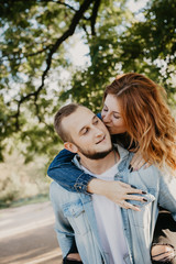 Naklejka premium Happy loving couple outdoor in park .