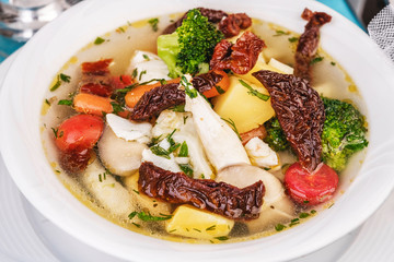 Knoop of veal and seafood with vegetables according to the Mediterranean recipe
