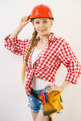 Happy woman in protective helmet