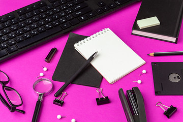 School stationery on a pink background. Back to school creative supplies