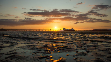 Gliding across the sands at sunset