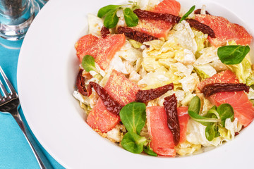 Mediterranean salad. Cabbage, tomatoes, smoked seeds, olives, olives, basil and rosemary, seasoned with olive oil and balsamic sauce