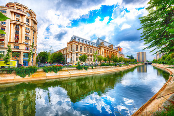 Antique building view in Old Town Bucharest city - capital of Romania and Dambrovita river - obrazy, fototapety, plakaty