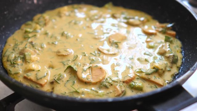 Gluten Free Chickpea Flour Pancake. Vegan Omelette Chilla Or Cheela Cooking On Pan