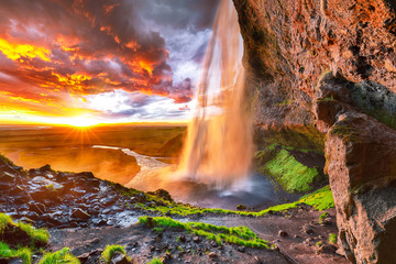 Fototapeta na wymiar Beautiful Seljalandsfoss waterfall in Iceland during the sunset